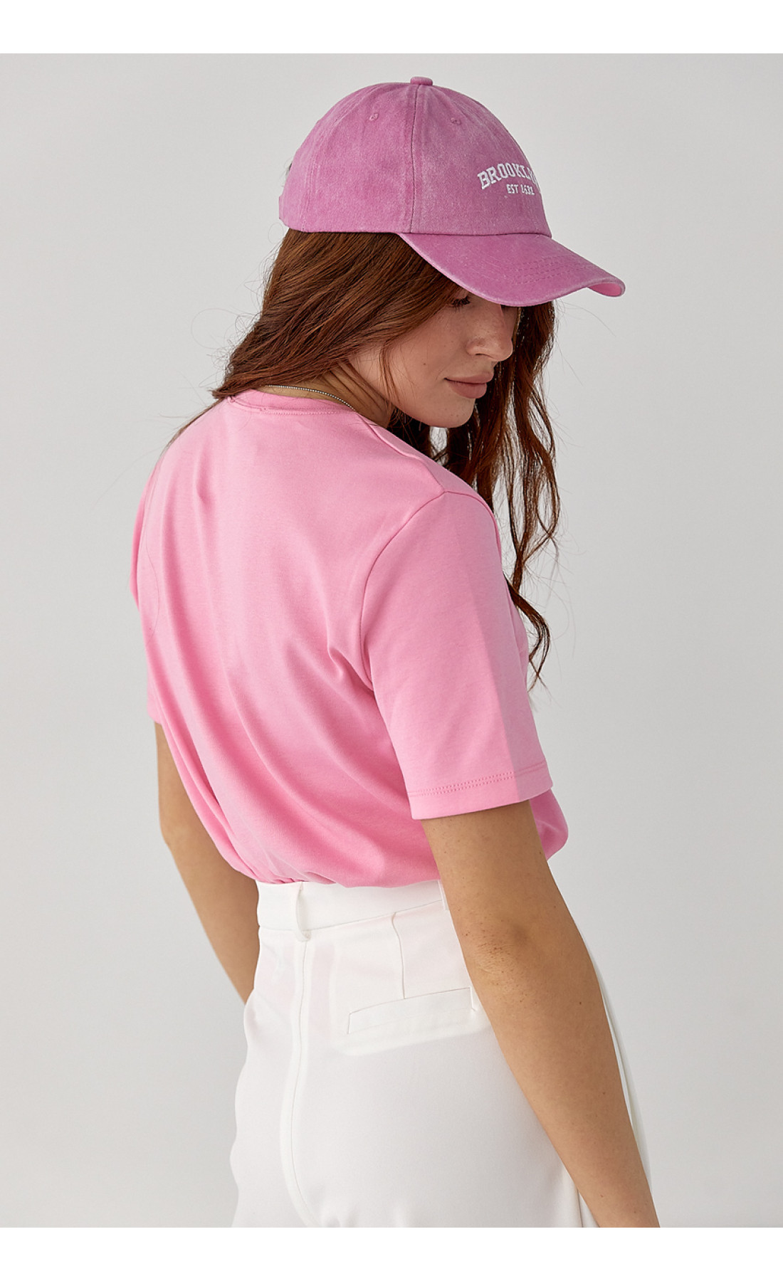 Футболка з написом і бантами  рожевий колір