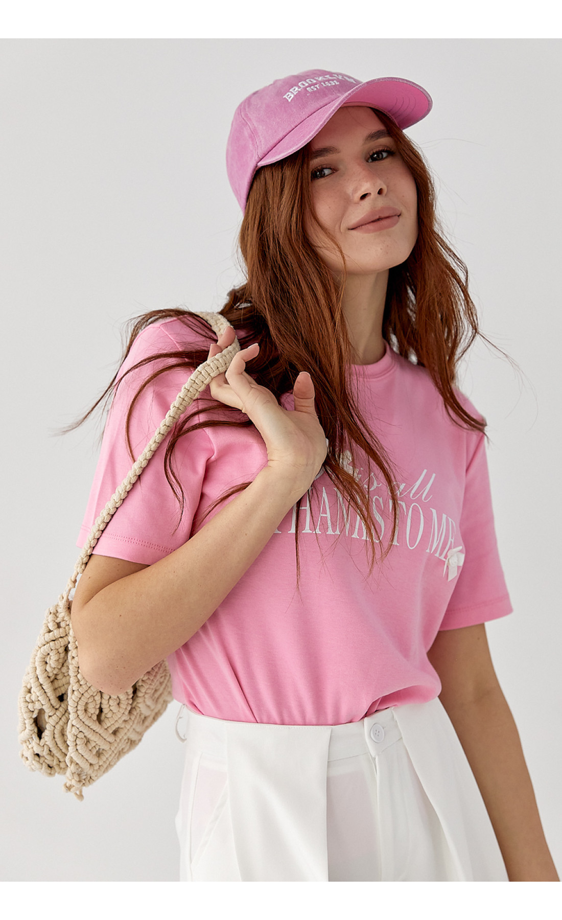 Футболка з написом і бантами  рожевий колір