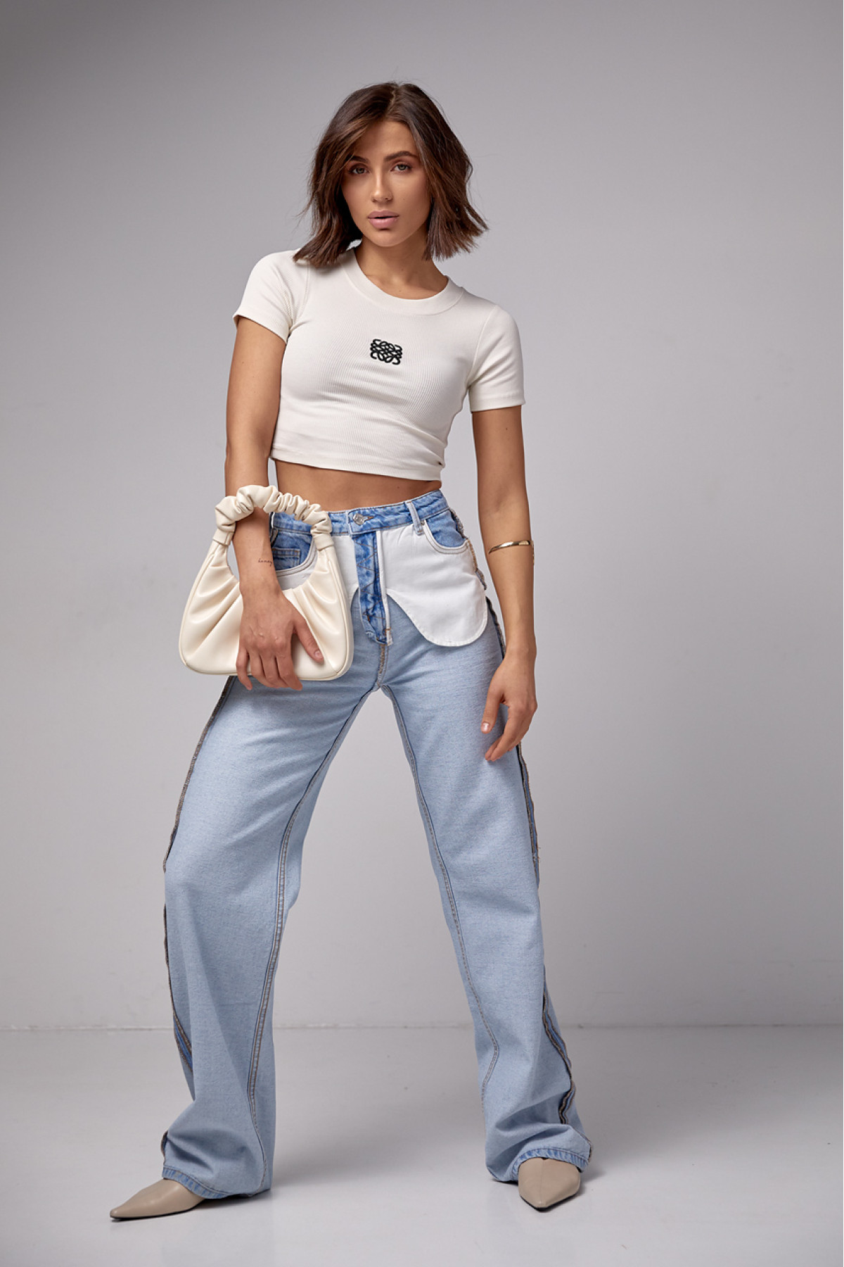 Жіночі жіночі джинси з ефектом навиворіт  блакитний колір