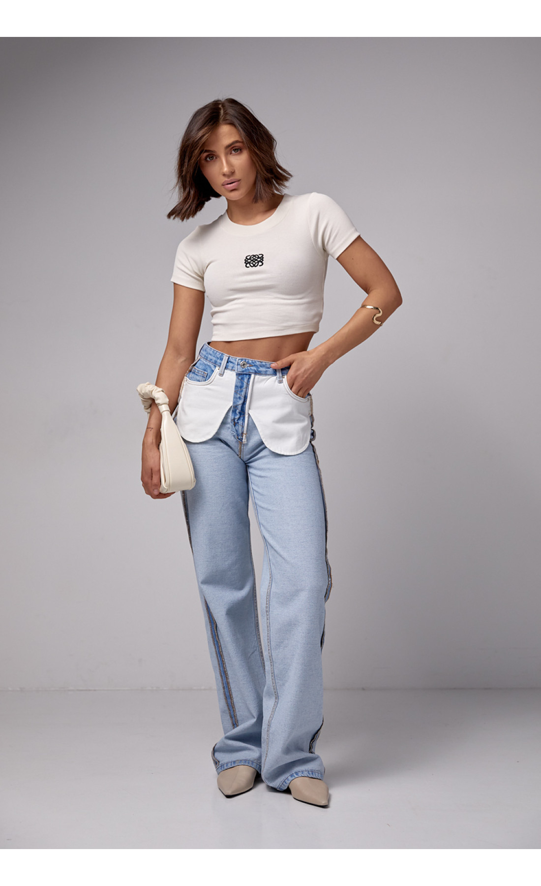 Жіночі жіночі джинси з ефектом навиворіт  блакитний колір