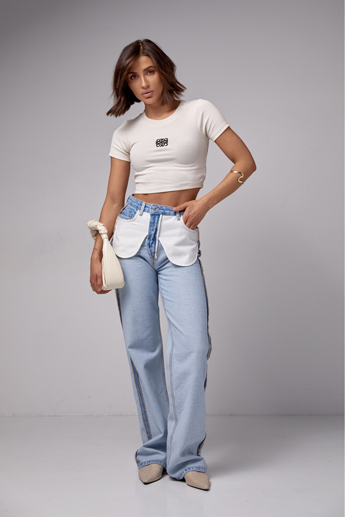 Жіночі жіночі джинси з ефектом навиворіт  блакитний колір