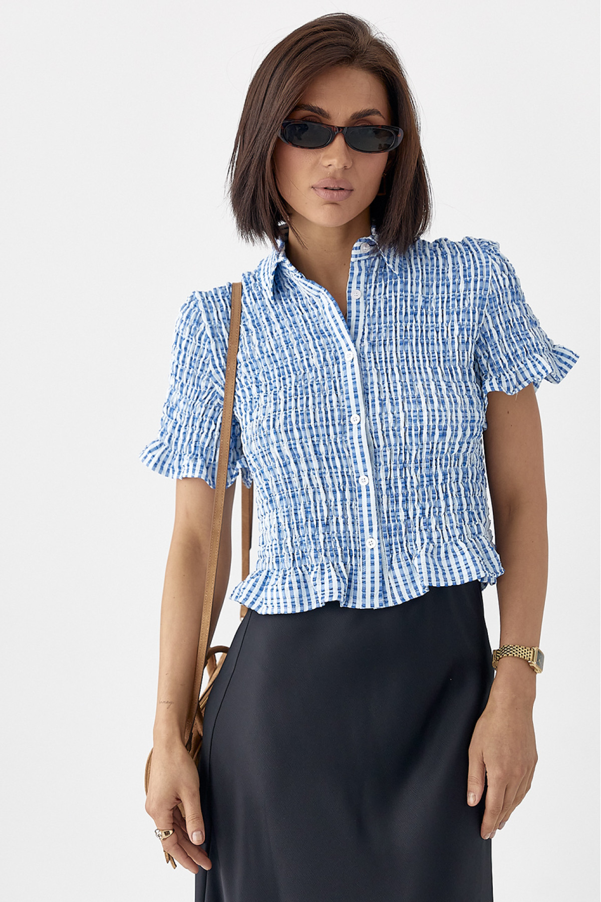 Смугаста блуза з ефектом жатки  синій колір