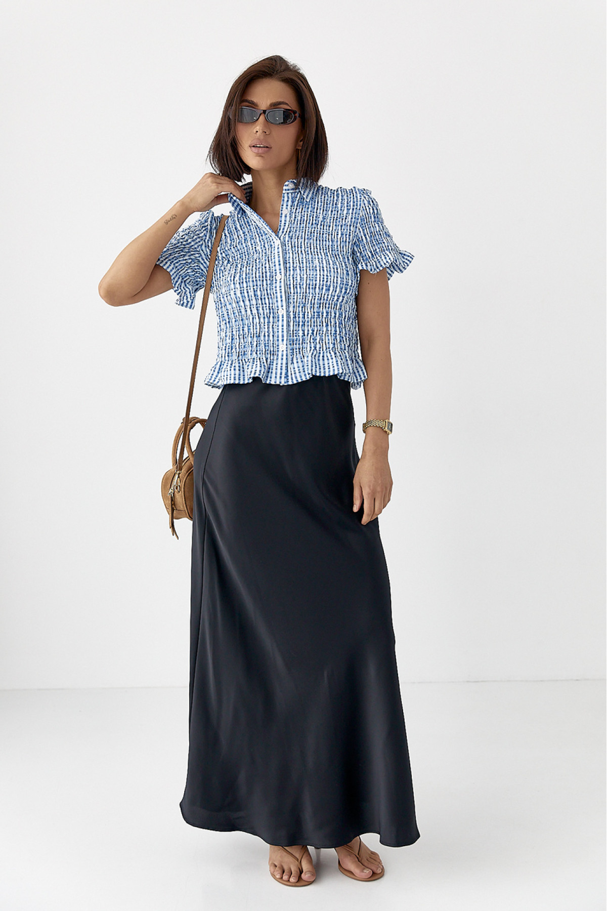 Смугаста блуза з ефектом жатки  синій колір