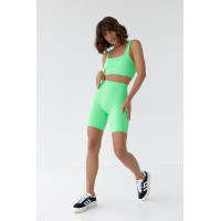 Жіночий еластичний костюм з велосипедками і топом  салатовий колір