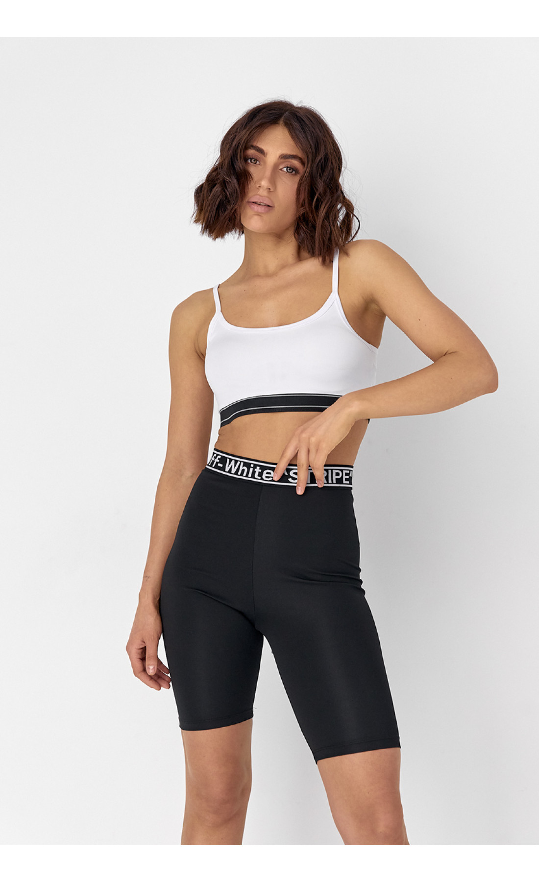 Жіночий костюм з велосипедними шортами та топом  чорний колір
