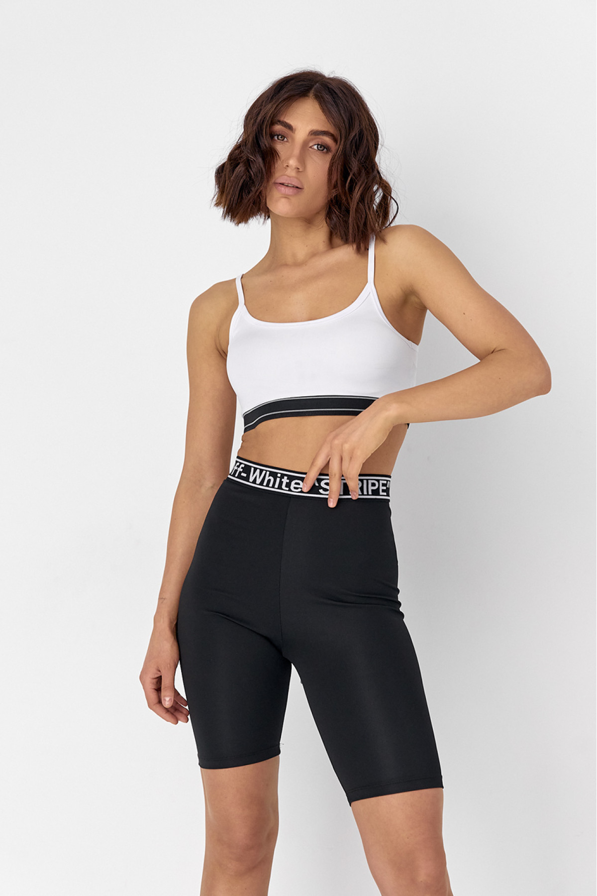 Жіночий костюм з велосипедними шортами та топом  чорний колір