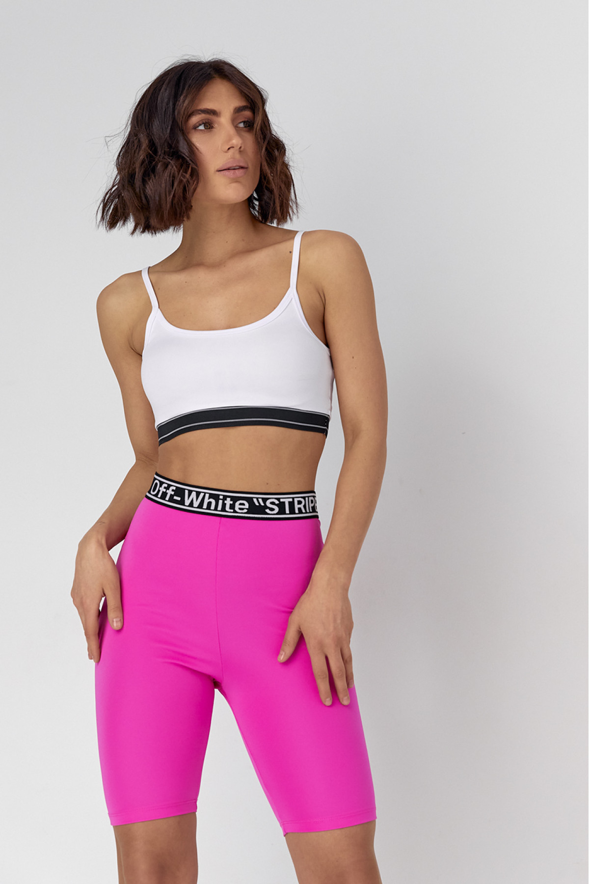 Жіночий костюм з велосипедними шортами та топом  фуксія колір