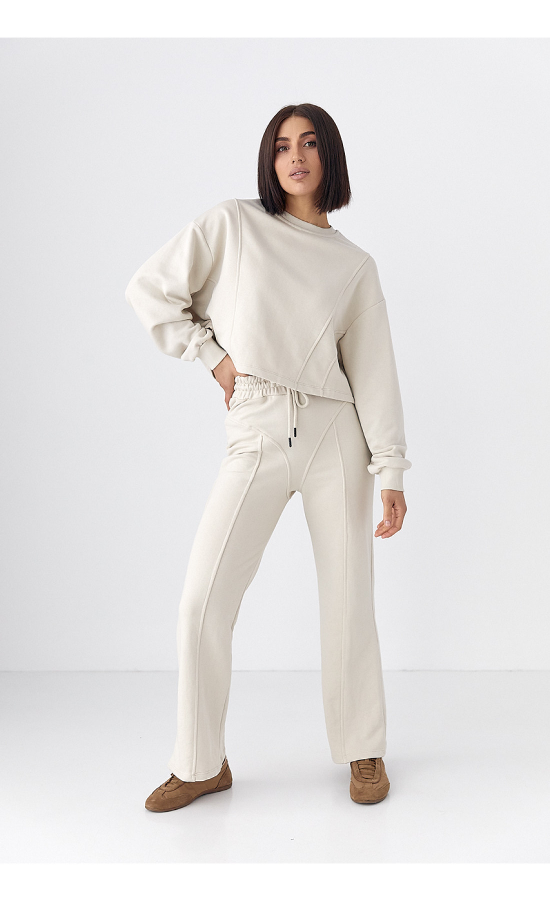 Спортивний костюм жіночий з акцентними швами  бежевий колір