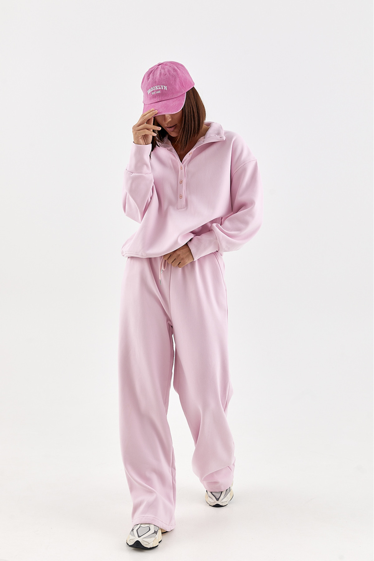 Спортивний костюм вільного крою зі світшотомполо  рожевий колір