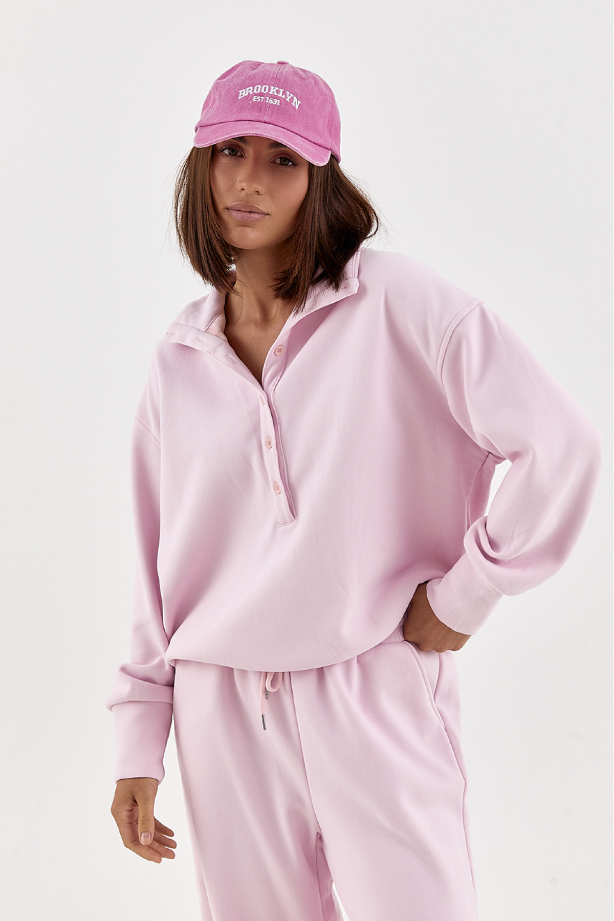 Спортивний костюм вільного крою зі світшотомполо  рожевий колір