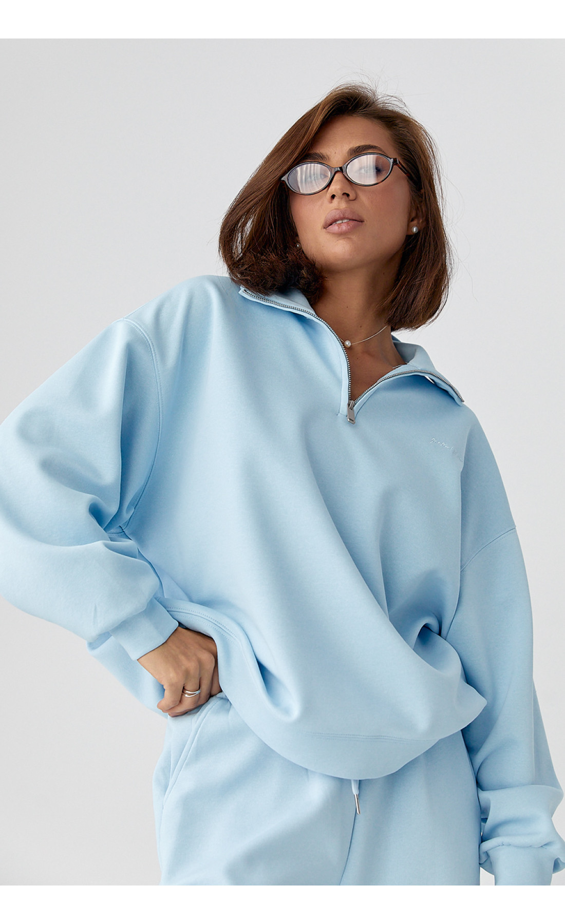 Однотонний спортивний костюм із написом  блакитний колір