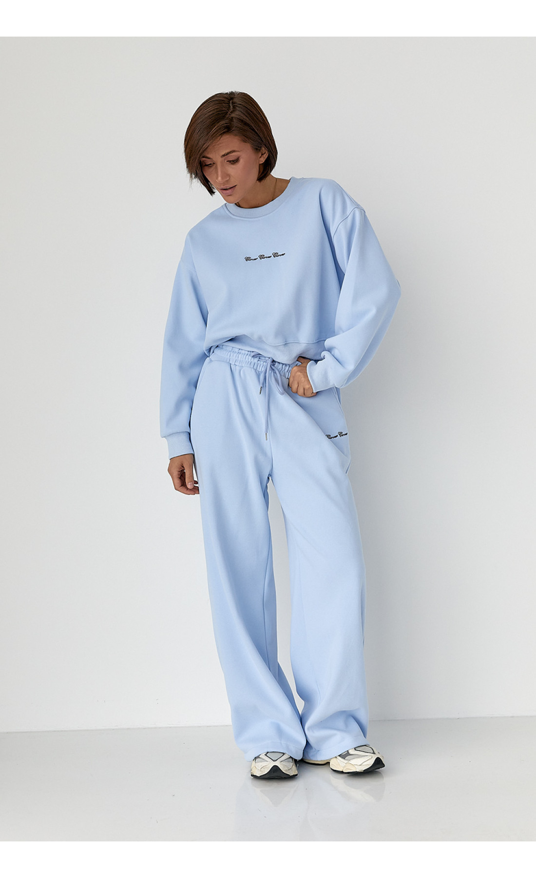 Спортивний костюм із плюшевим начосом з коротким світшотом та штанами палаццо  блакитний колір