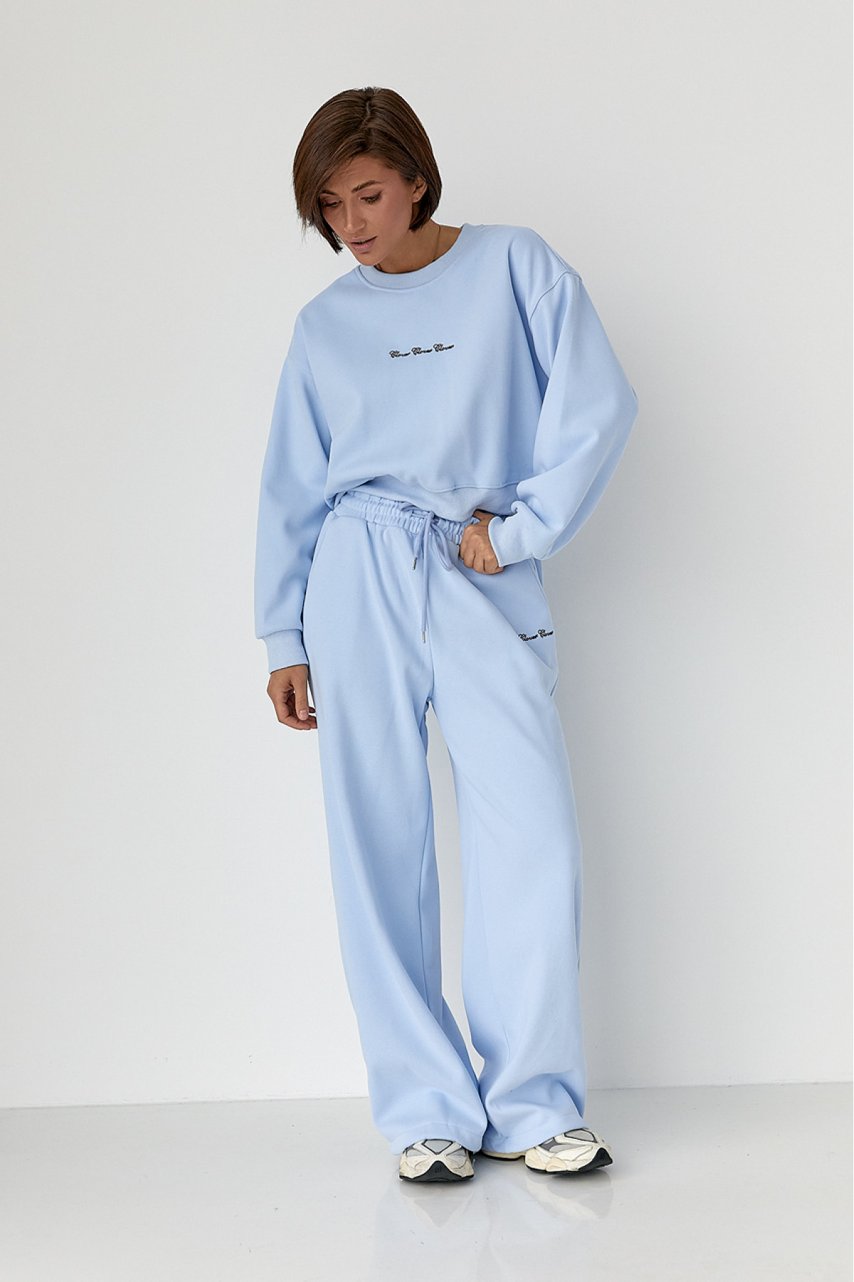 Спортивний костюм із плюшевим начосом з коротким світшотом та штанами палаццо  блакитний колір