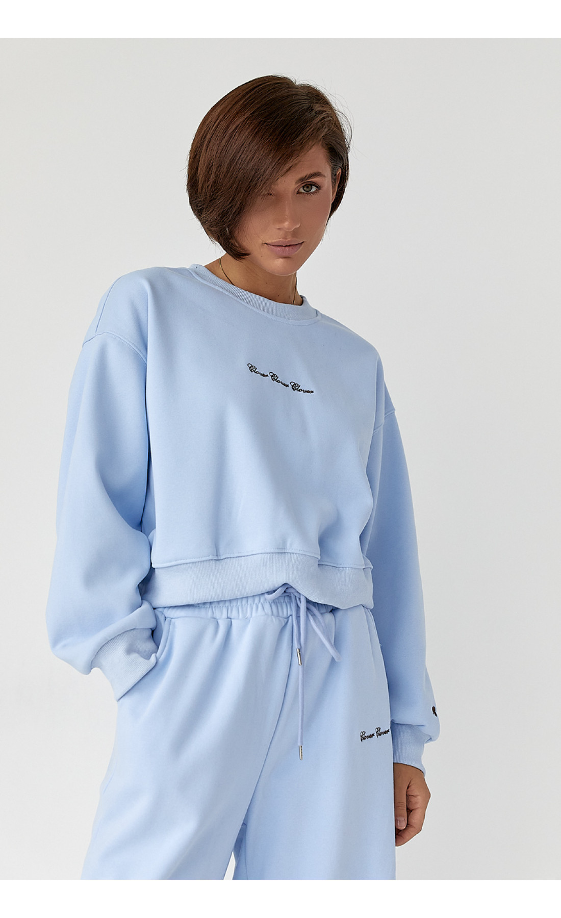 Спортивний костюм із плюшевим начосом з коротким світшотом та штанами палаццо  блакитний колір