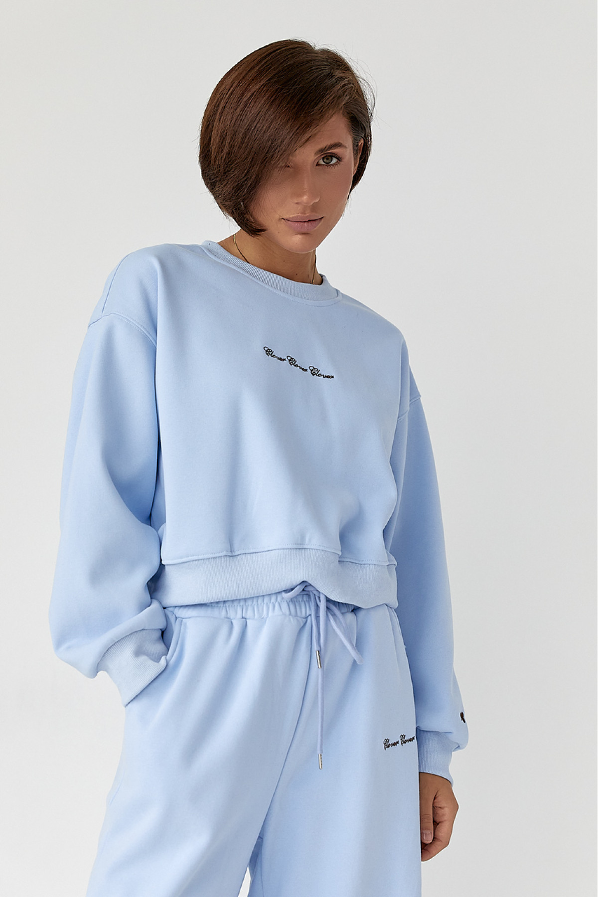 Спортивний костюм із плюшевим начосом з коротким світшотом та штанами палаццо  блакитний колір