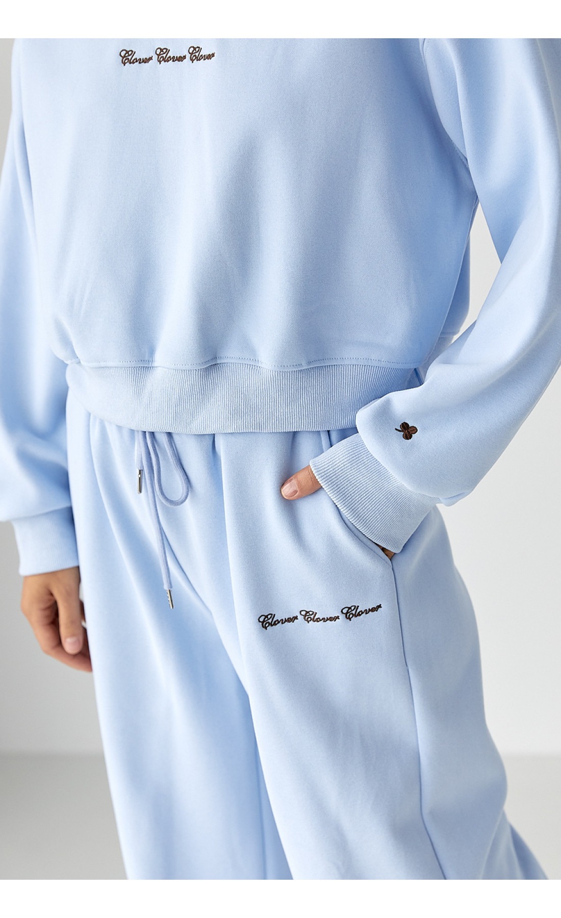 Спортивний костюм із плюшевим начосом з коротким світшотом та штанами палаццо  блакитний колір