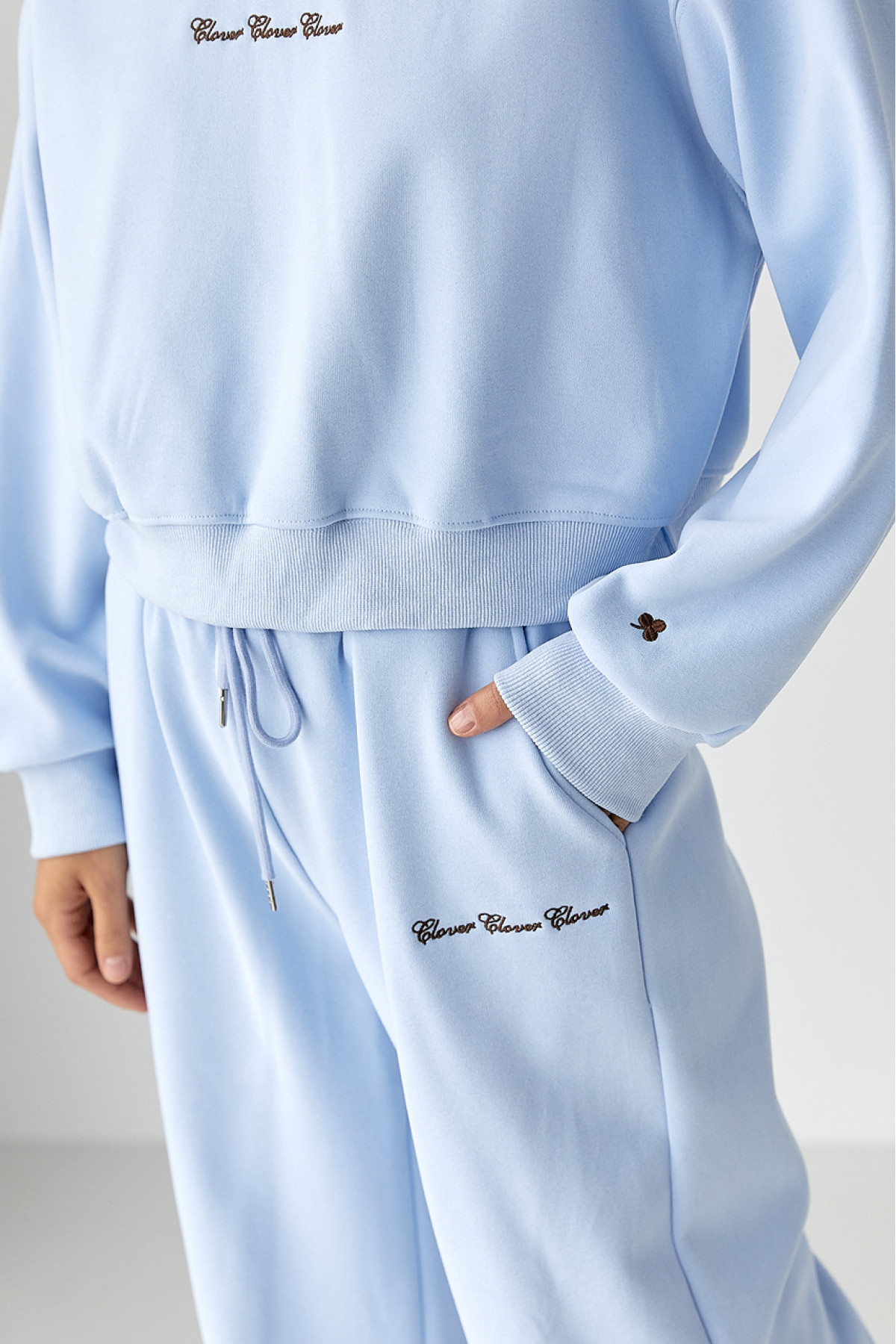 Спортивний костюм із плюшевим начосом з коротким світшотом та штанами палаццо  блакитний колір