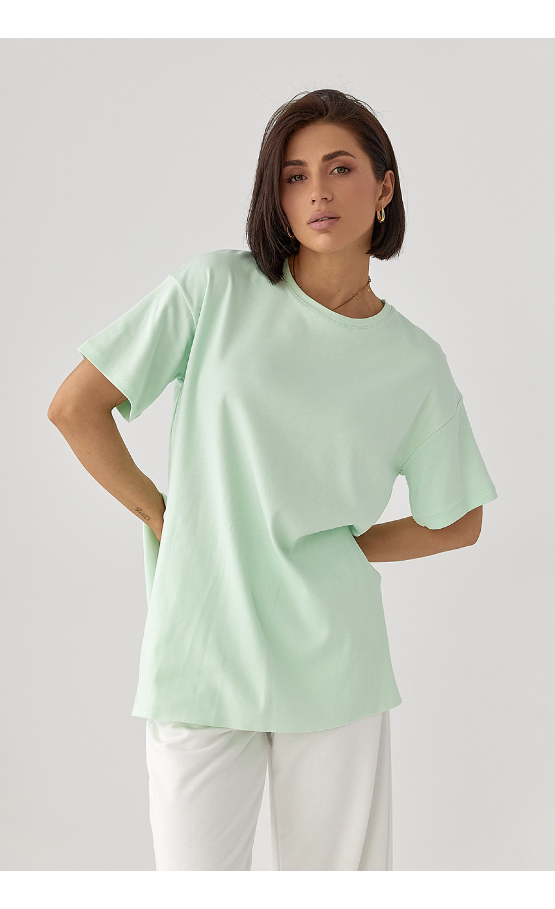 Однотонна футболка з розрізами  м'ятний колір