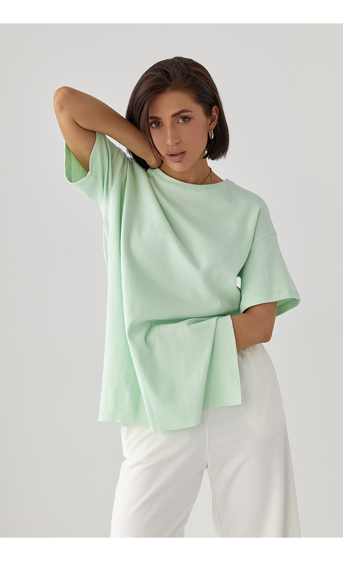 Однотонна футболка з розрізами  м'ятний колір