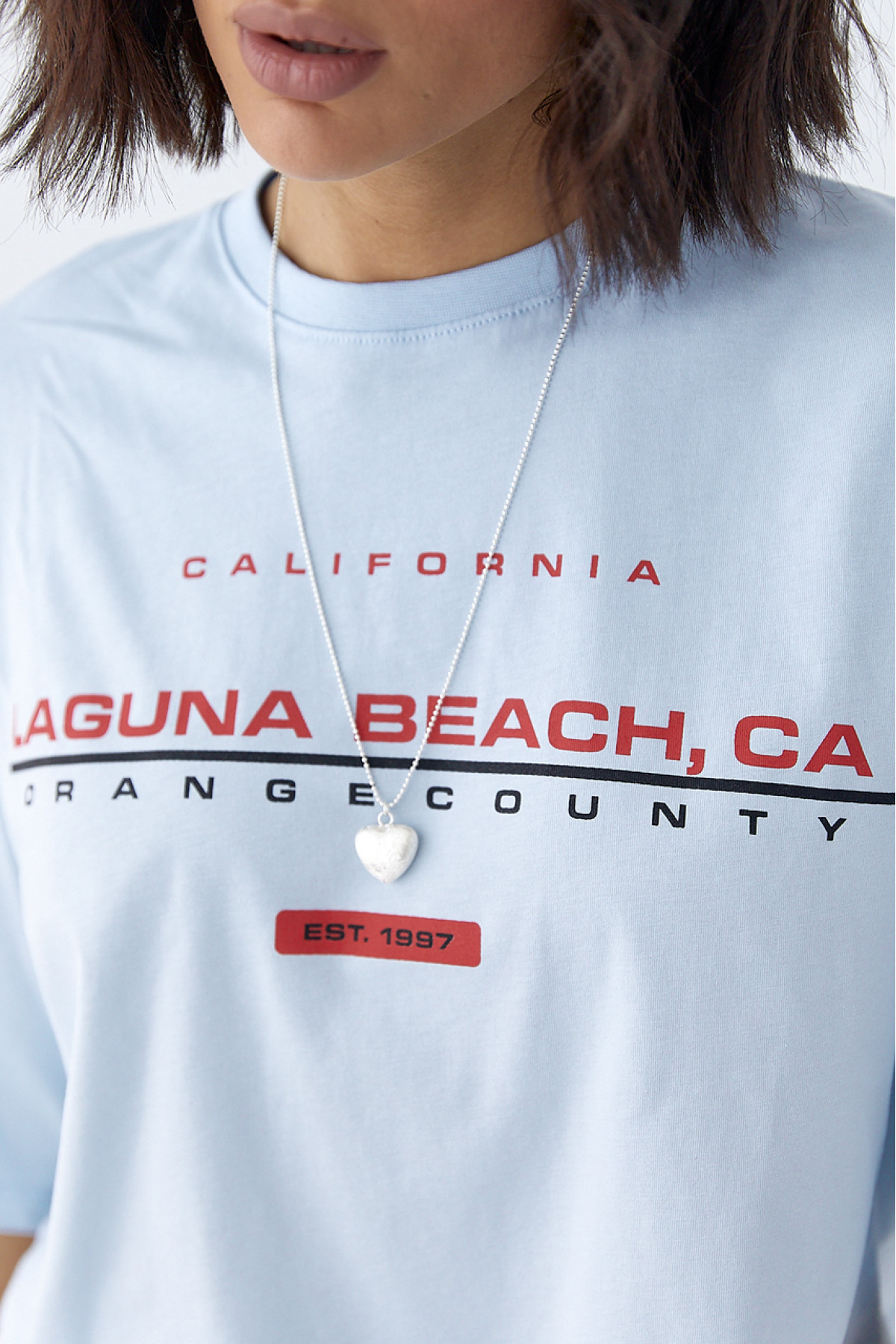 Укорочена футболка вільного крою  блакитний колір