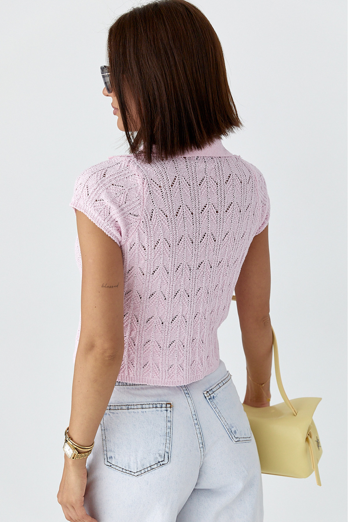 Жіноче поло на ґудзиках з ажурної в'язки  рожевий колір
