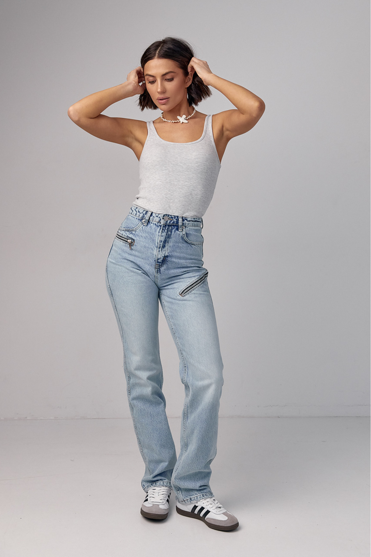 Жіночі жіночі джинси з блискавками  блакитний колір