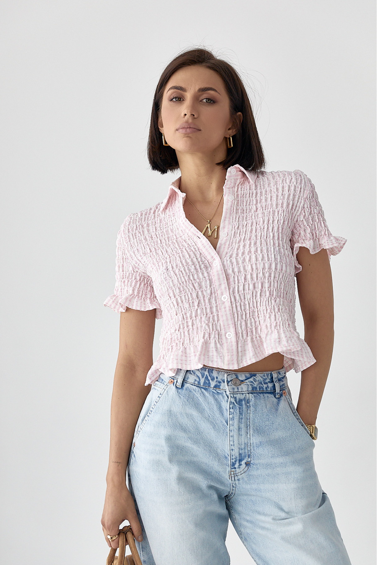 Смугаста блуза з ефектом жатки  рожевий колір