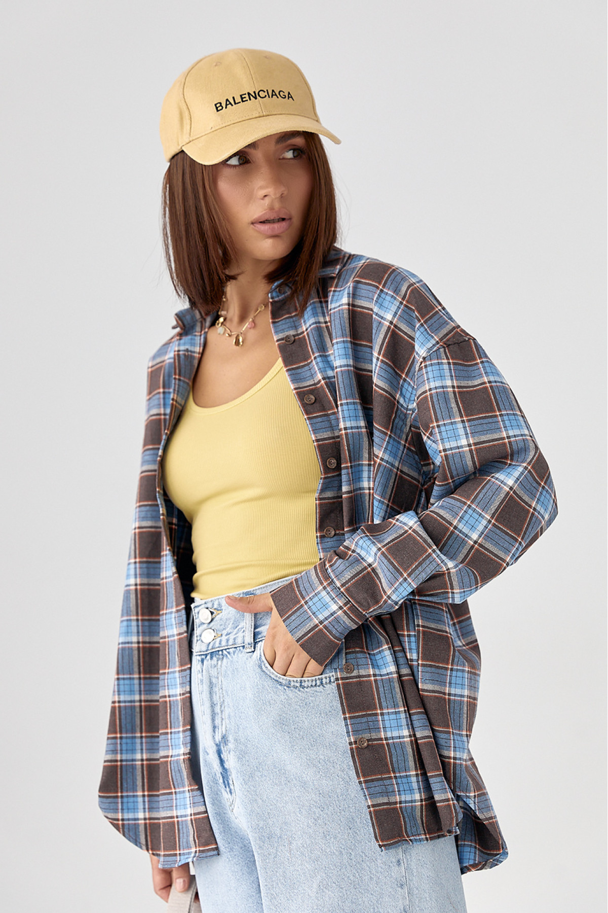 Клітчаста сорочка з напівкруглим низом  блакитний колір