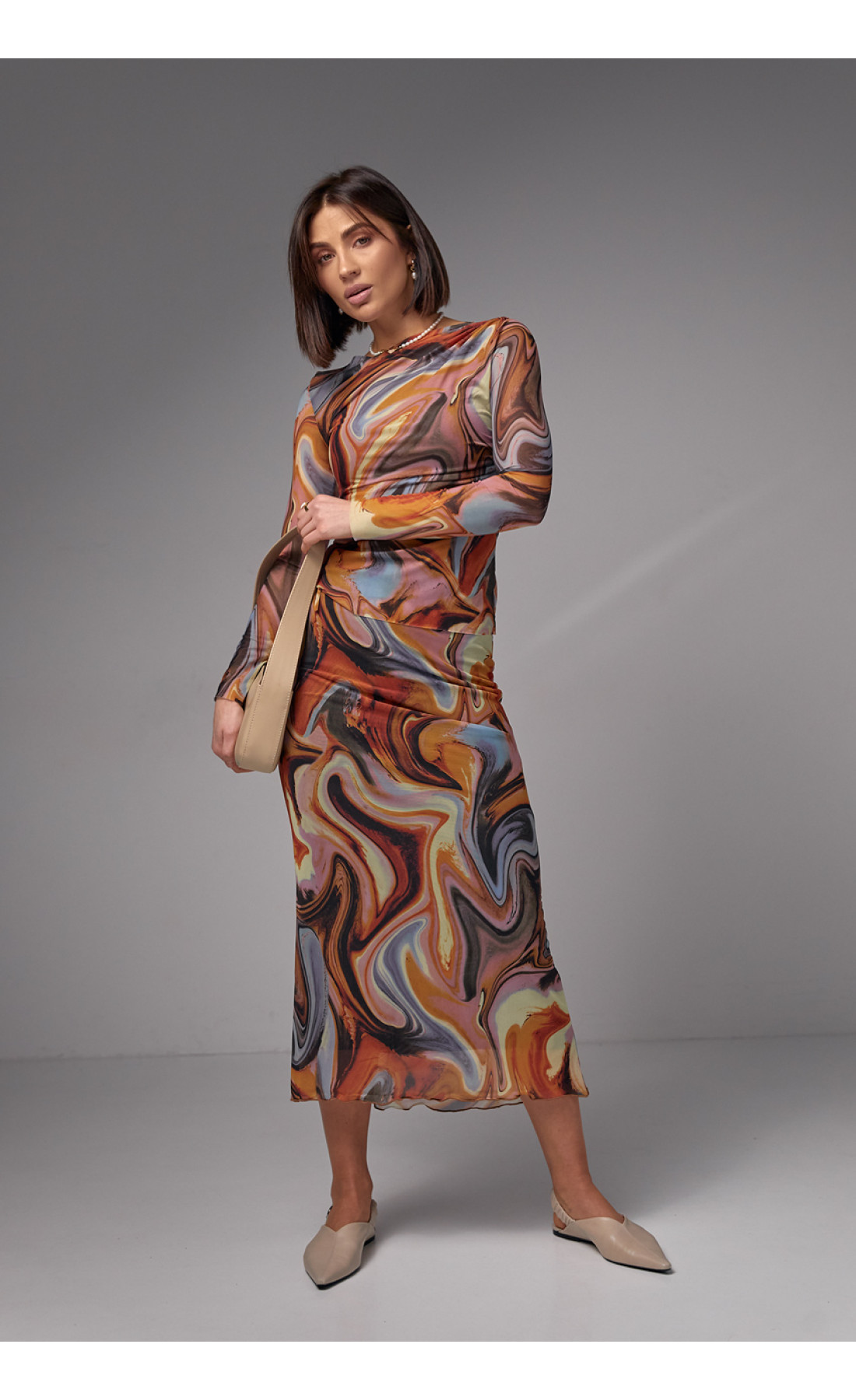 Костюм зі спідницеюміді та джемпером із сітки  теракотовий колір