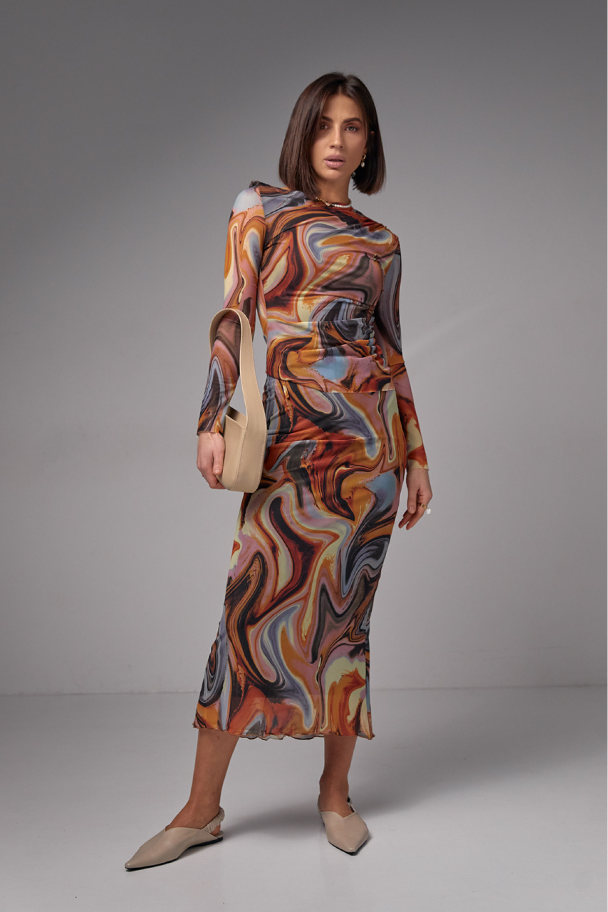 Костюм зі спідницеюміді та джемпером із сітки  теракотовий колір