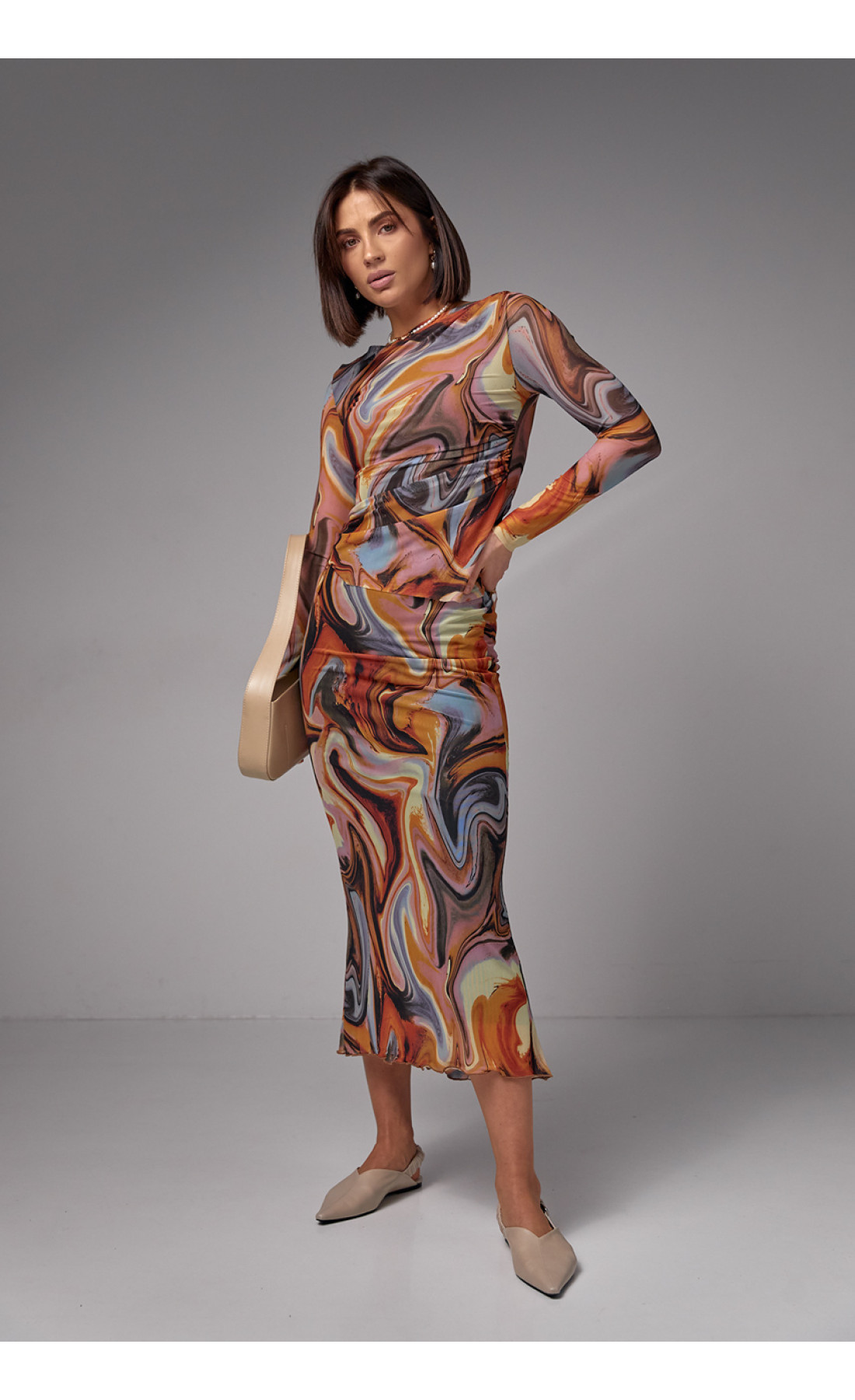 Костюм зі спідницеюміді та джемпером із сітки  теракотовий колір