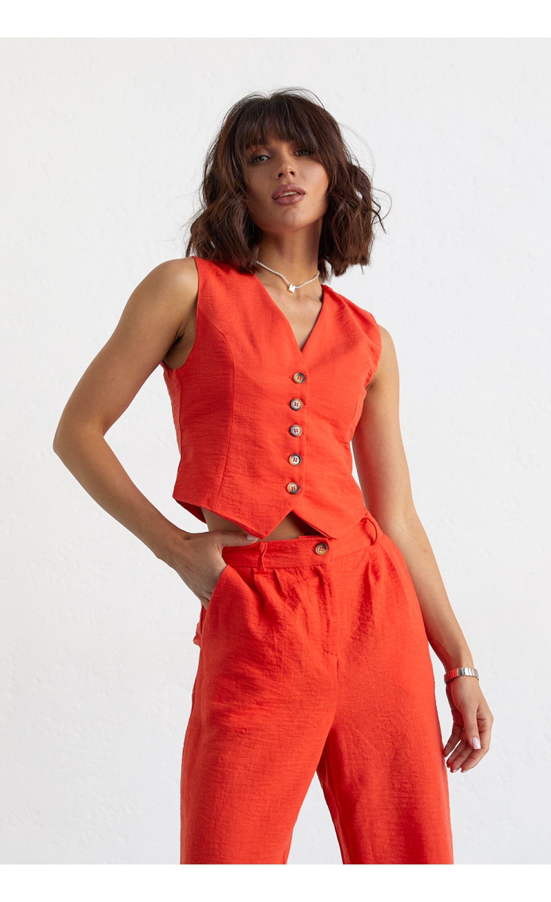 Жіночий брючний костюм із жилеткою  помаранчевий колір