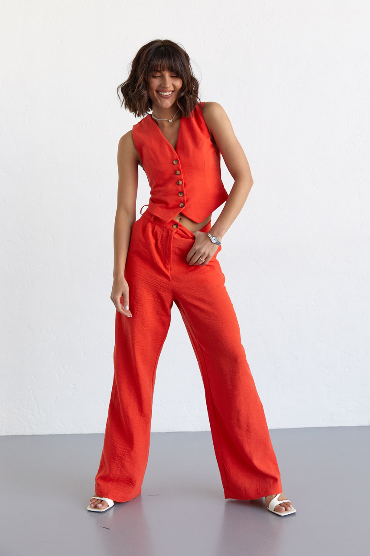 Жіночий брючний костюм із жилеткою  помаранчевий колір