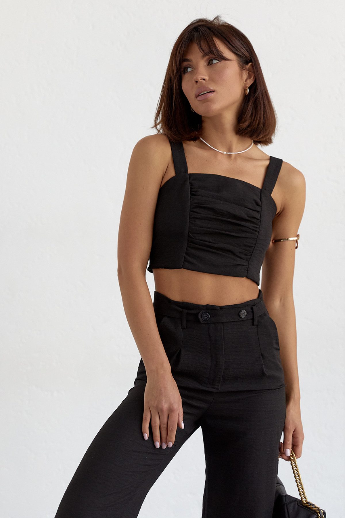 Жіночий бавовняний костюм із брюками та топом  чорний колір