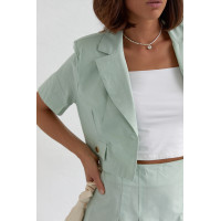 Костюм зі спідницею плісе і коротким жакетом  м'ятний колір