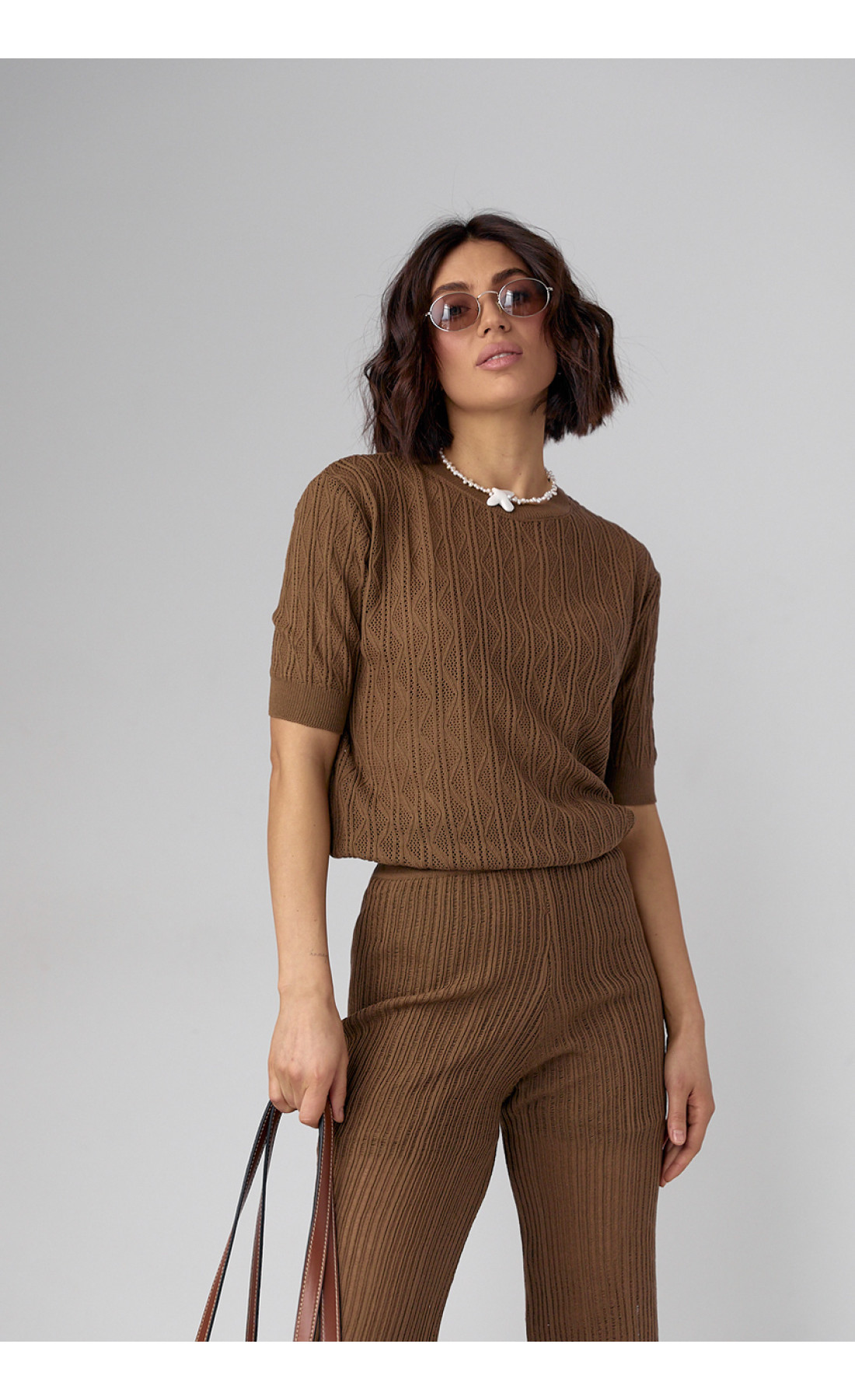 Жіночий костюм з ажурної в'язки  коричневий колір