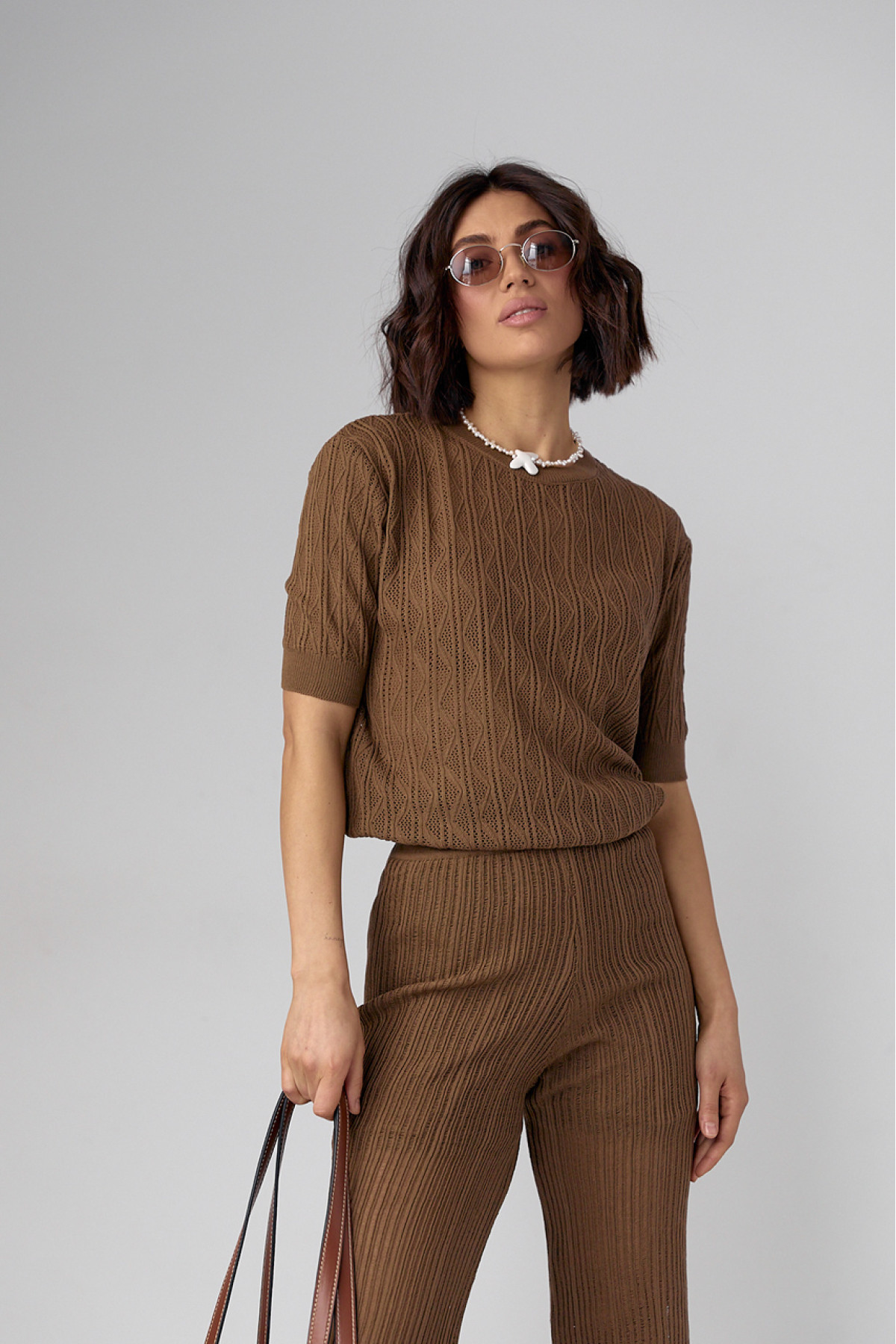 Жіночий костюм з ажурної в'язки  коричневий колір