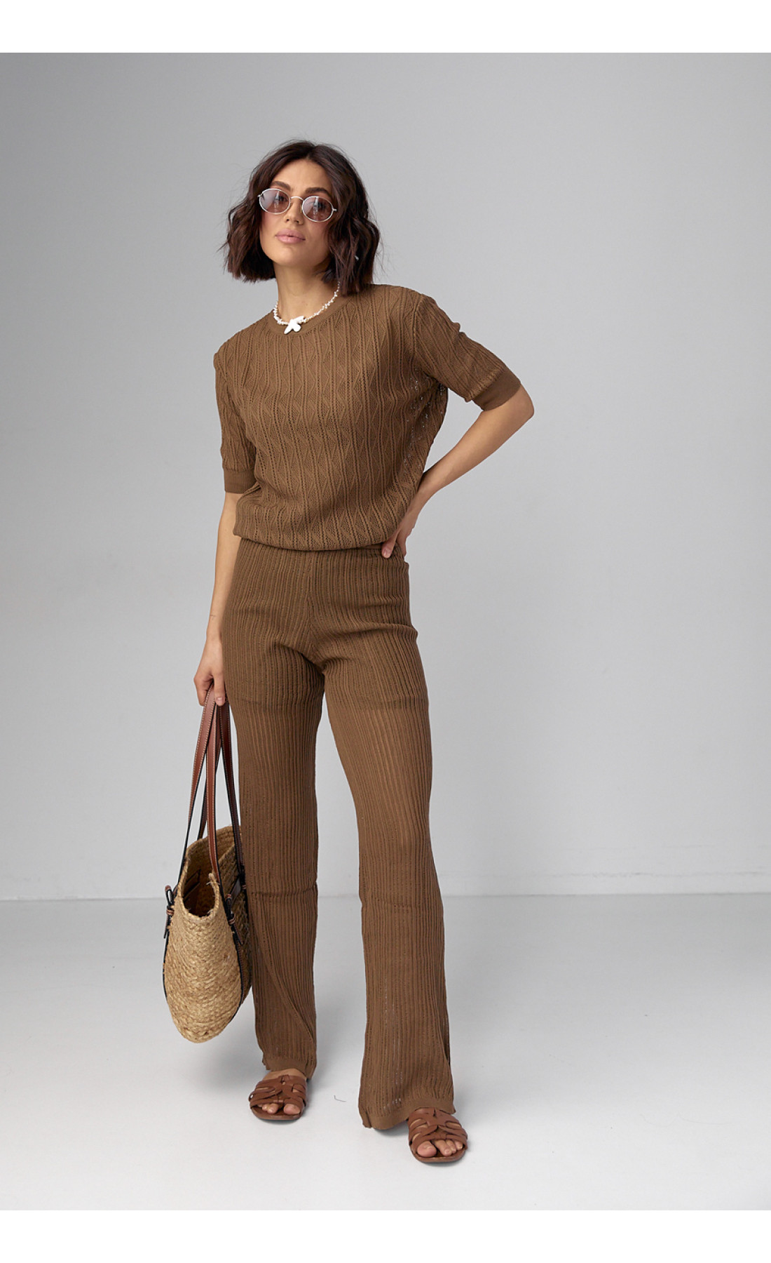 Жіночий костюм з ажурної в'язки  коричневий колір