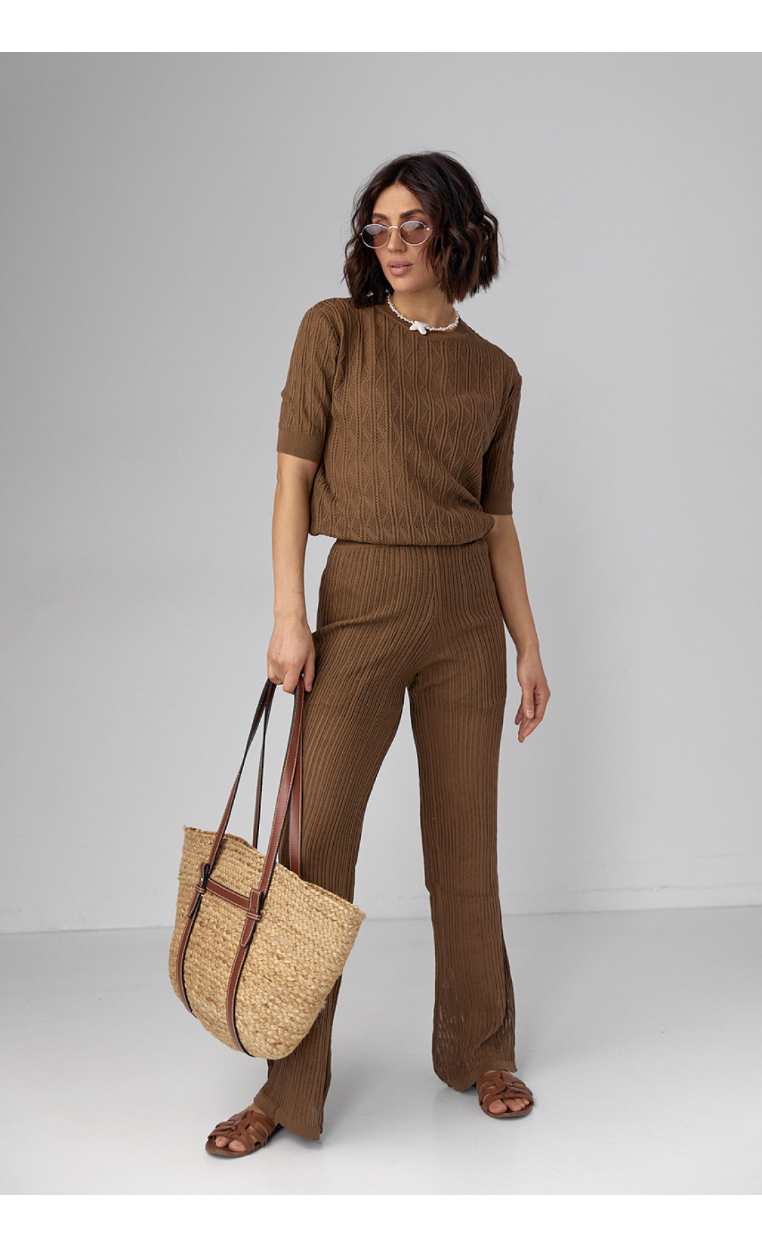 Жіночий костюм з ажурної в'язки  коричневий колір