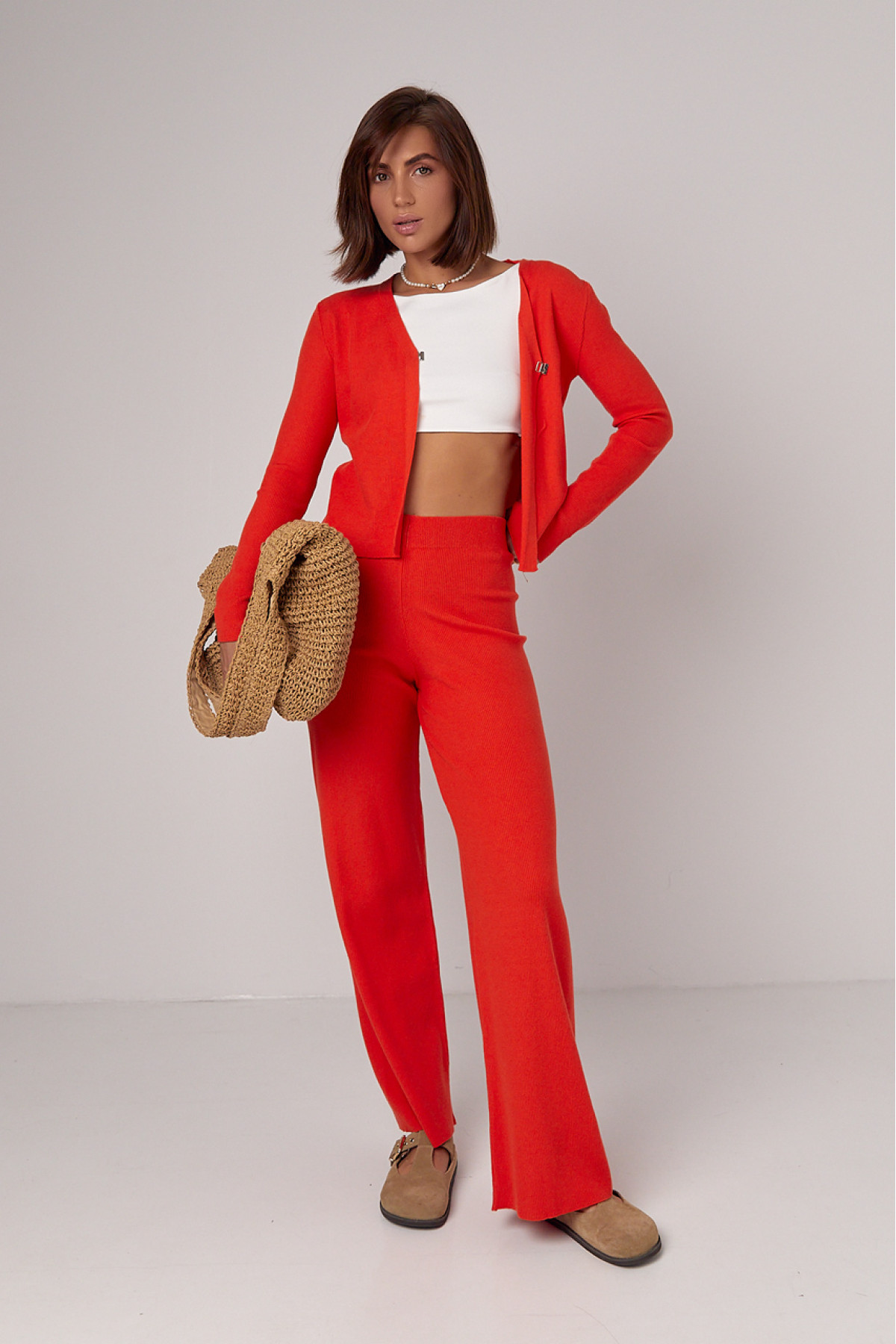 В'язаний жіночий костюм зі штанами та кардиганом  теракотовий колір