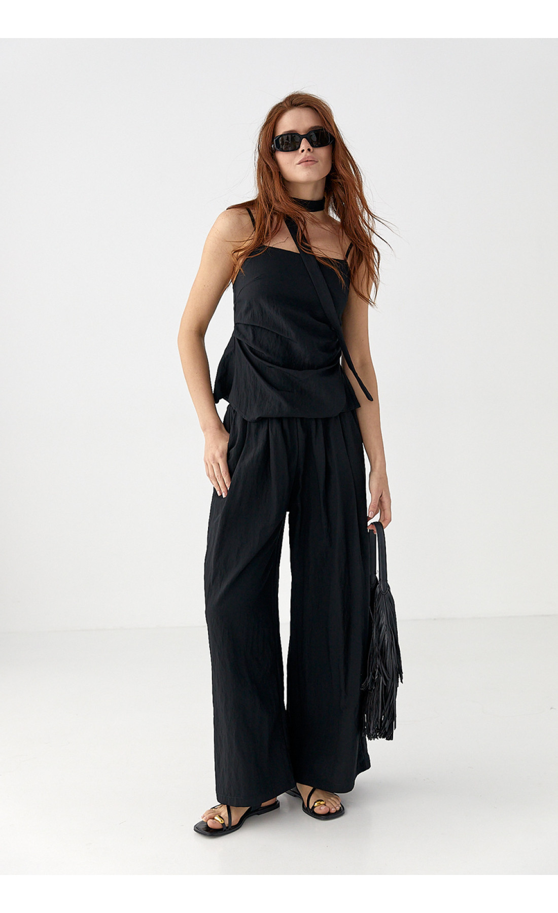 Костюм з асиметричним топом і штанамипалаццо  чорний колір