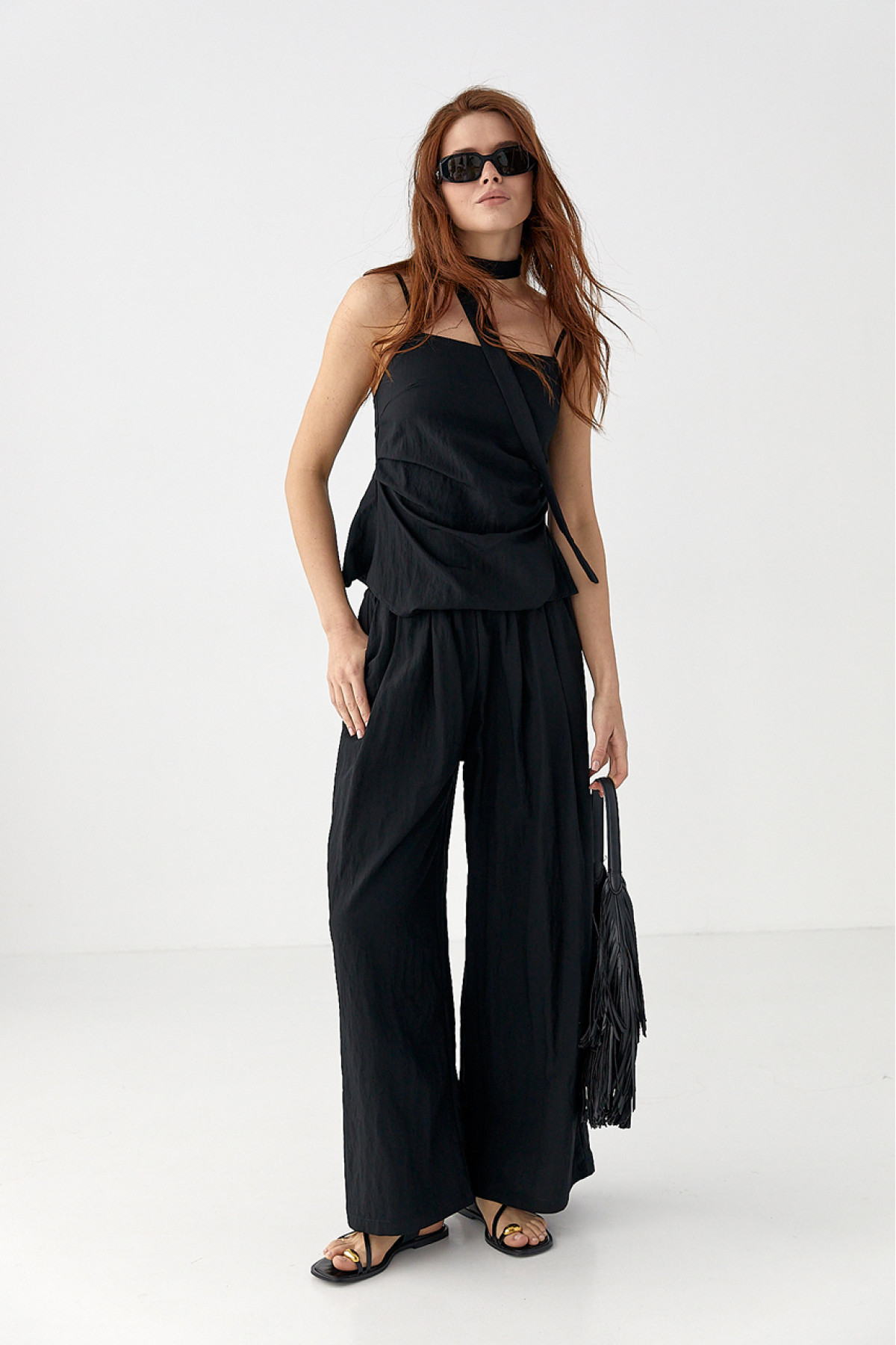 Костюм з асиметричним топом і штанамипалаццо  чорний колір