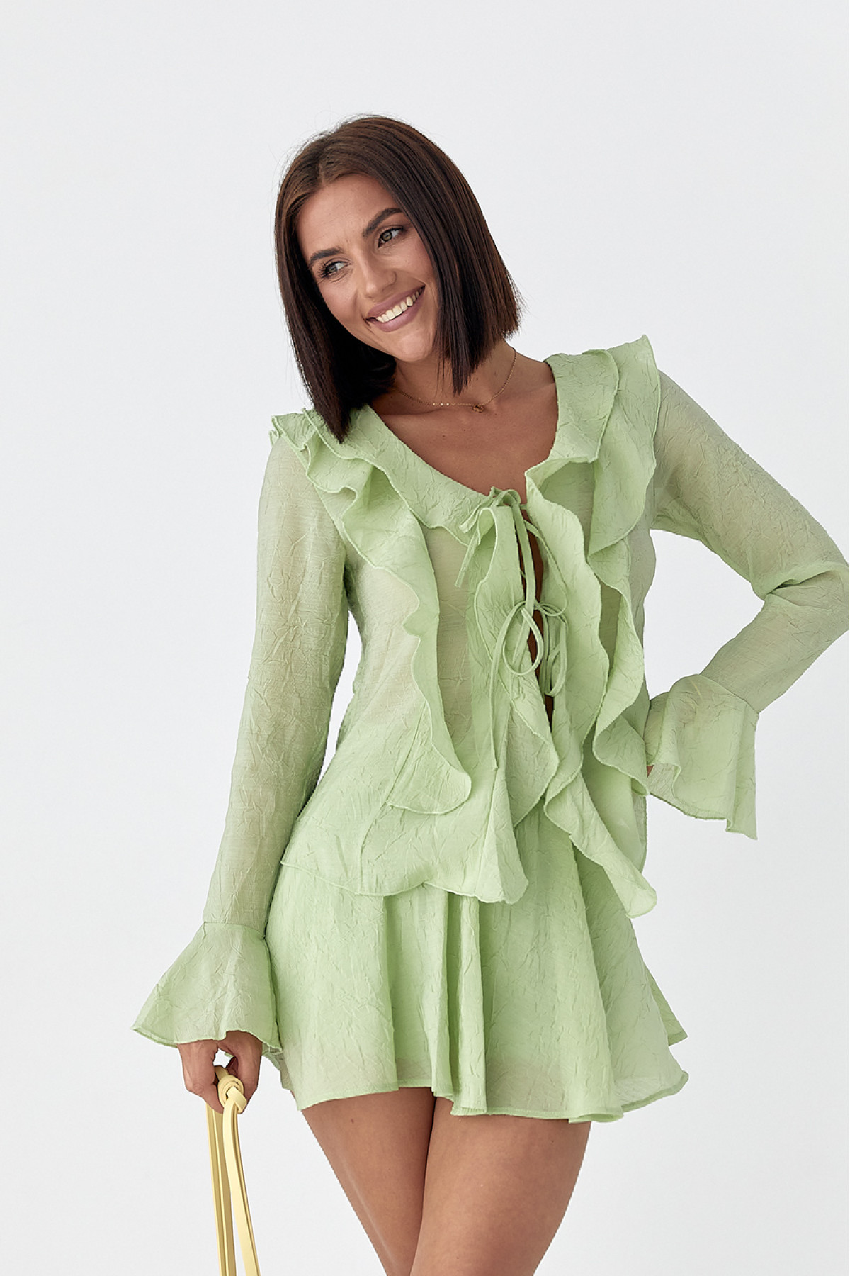 Літній костюм зі спідницею і блузою з рюшами  хакі колір