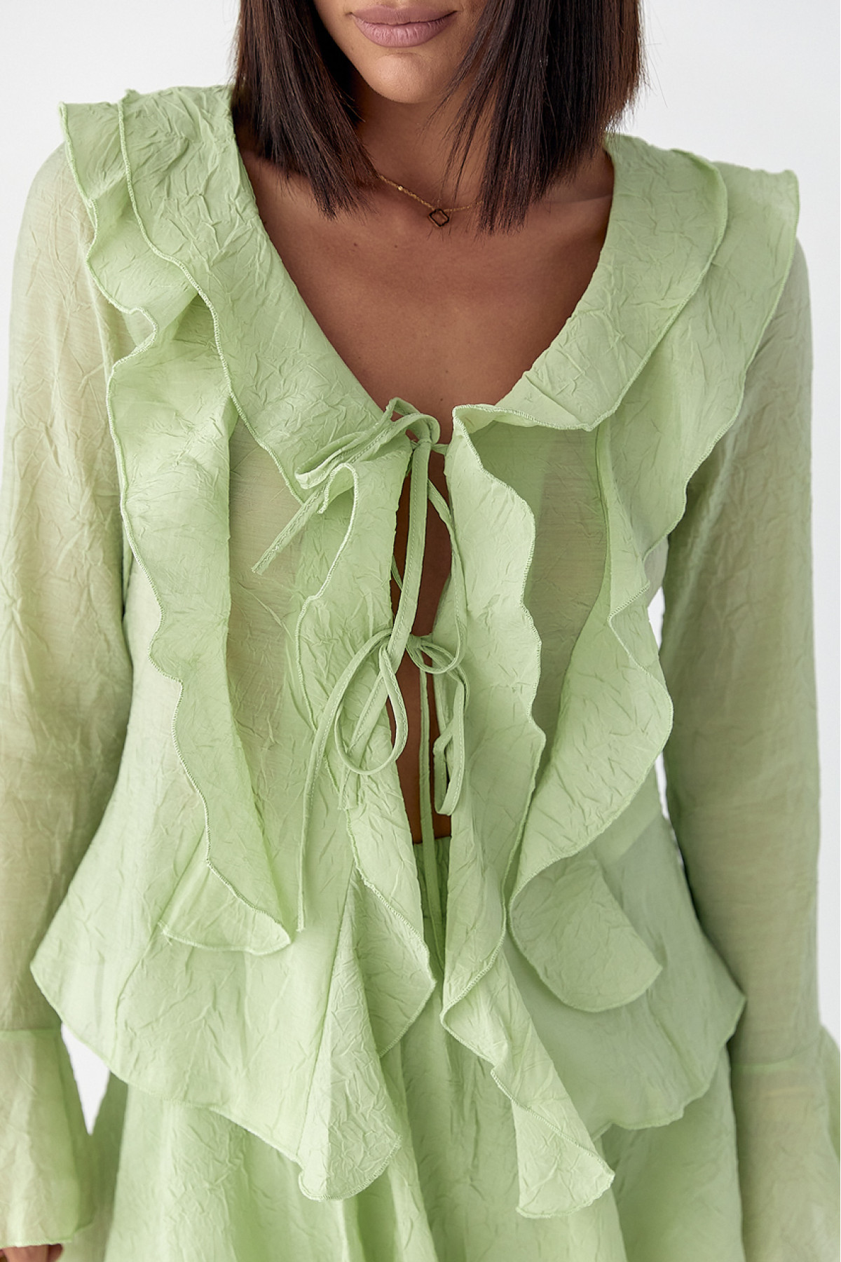 Літній костюм зі спідницею і блузою з рюшами  хакі колір