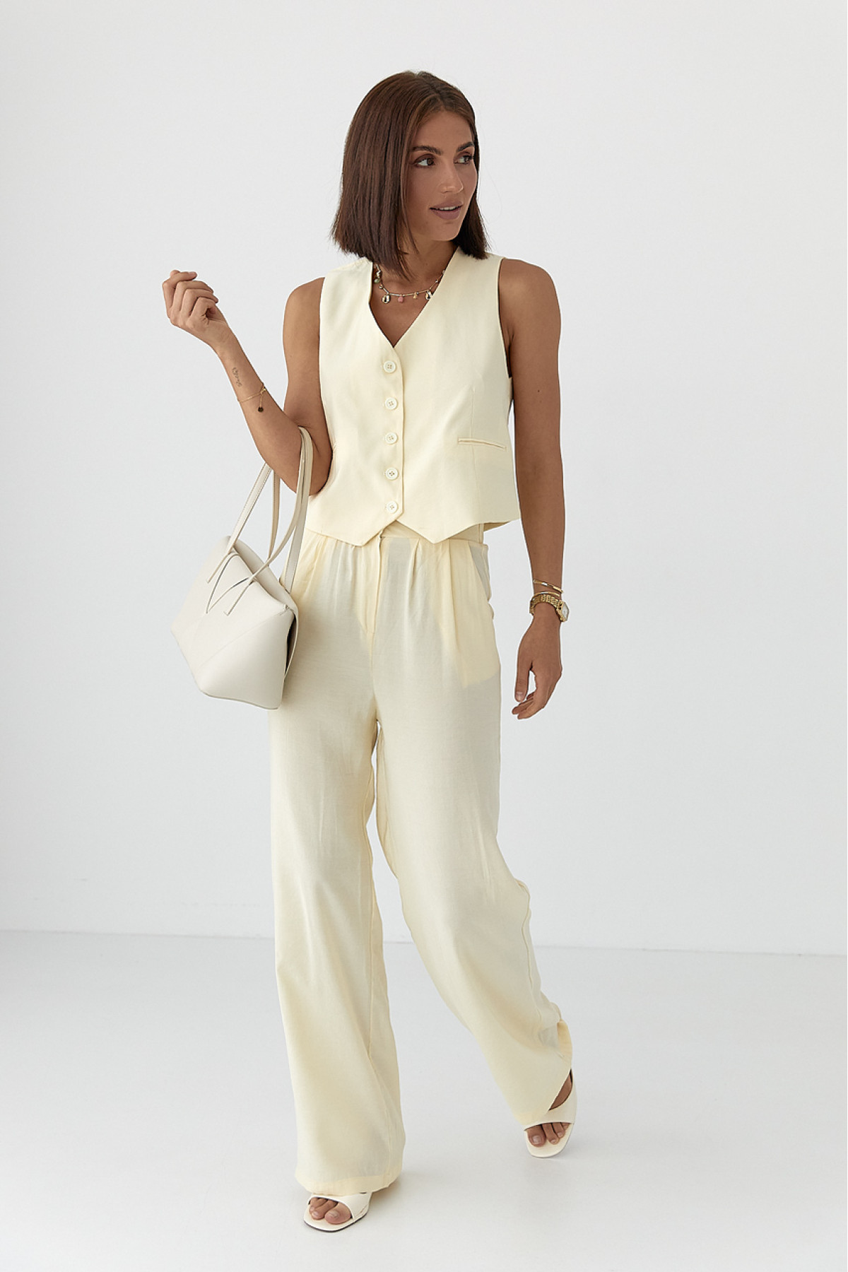 Літній брючний костюм із жилеткою  лимонний колір