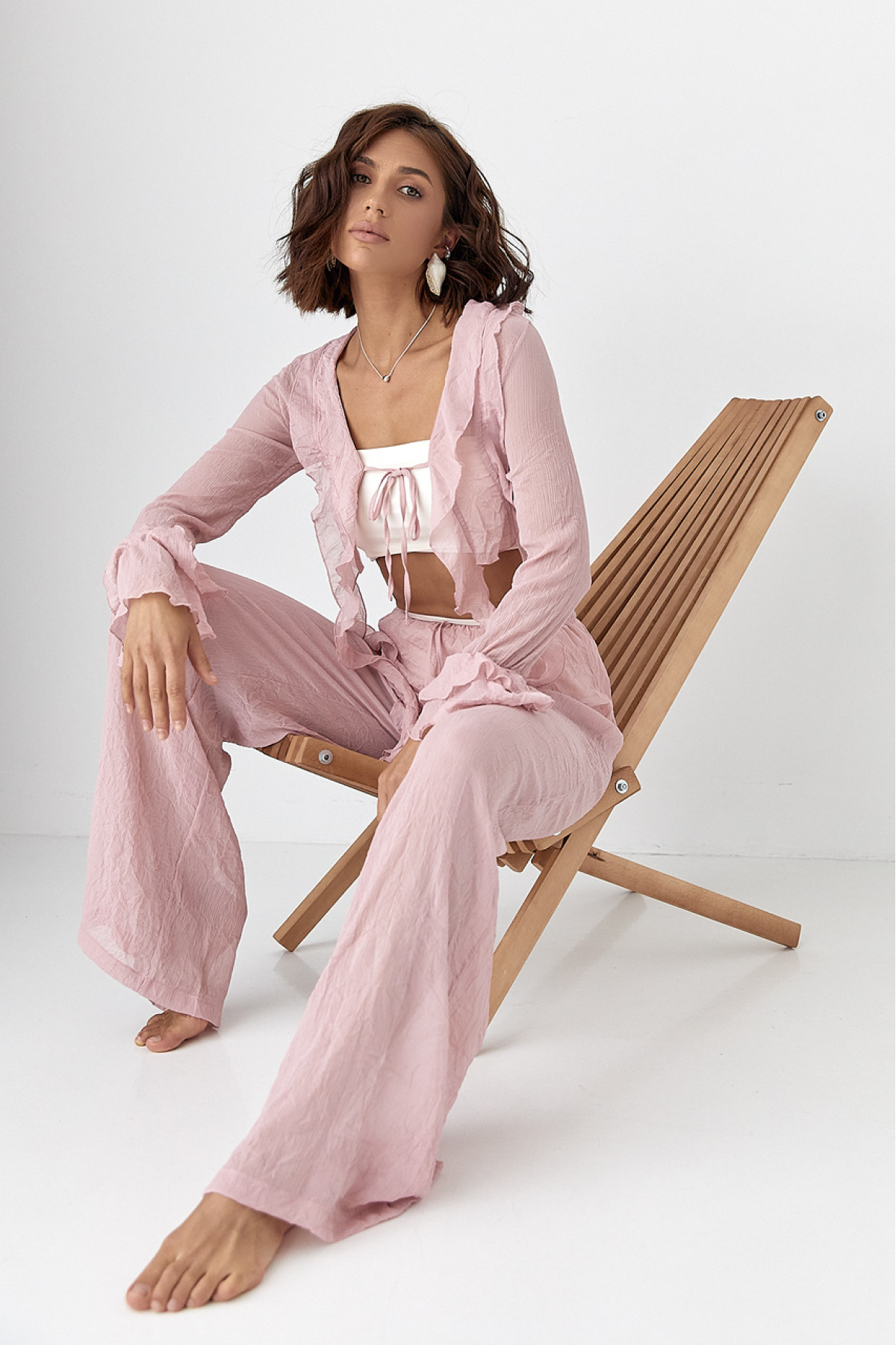 Прозорий пляжний костюм з рюшами  пудра колір