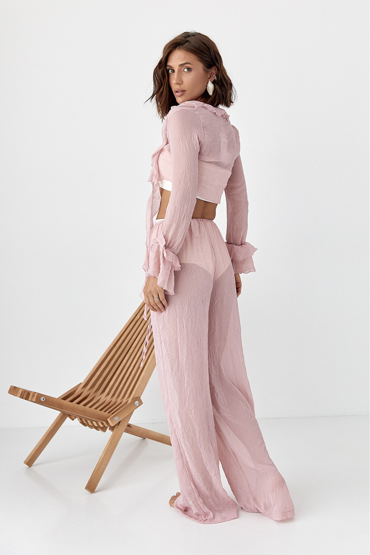 Прозорий пляжний костюм з рюшами  пудра колір