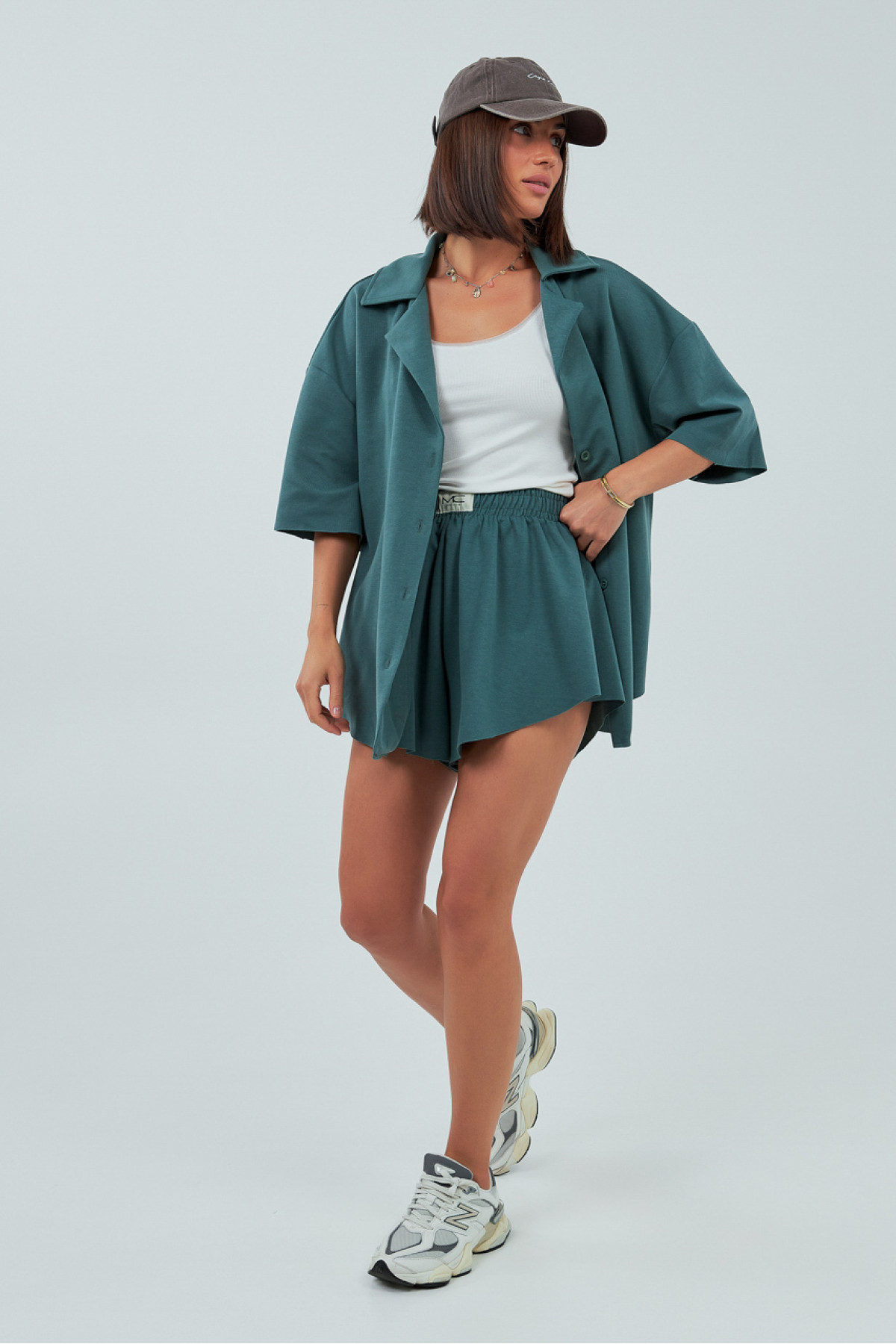 Трикотажний костюм із шортами та сорочкою  зелений колір