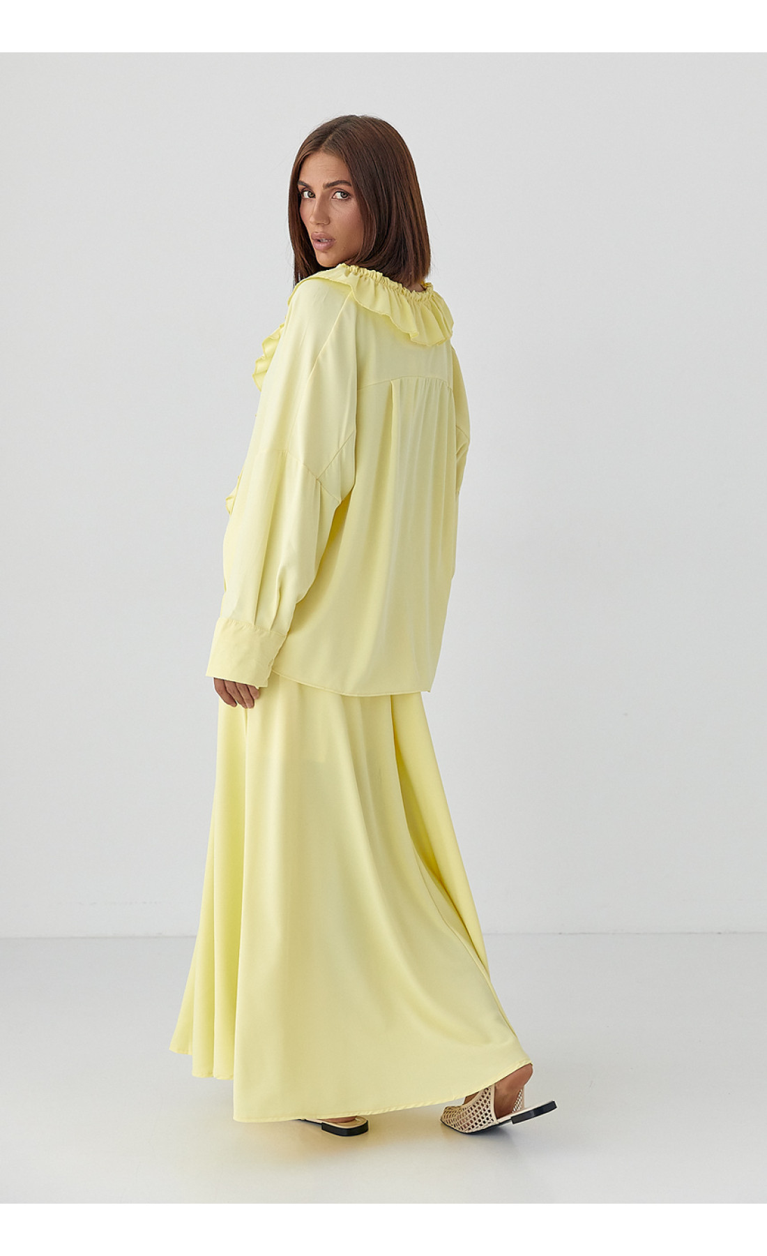 Костюм з рюшами зі спідниці та блузи  лимонний колір