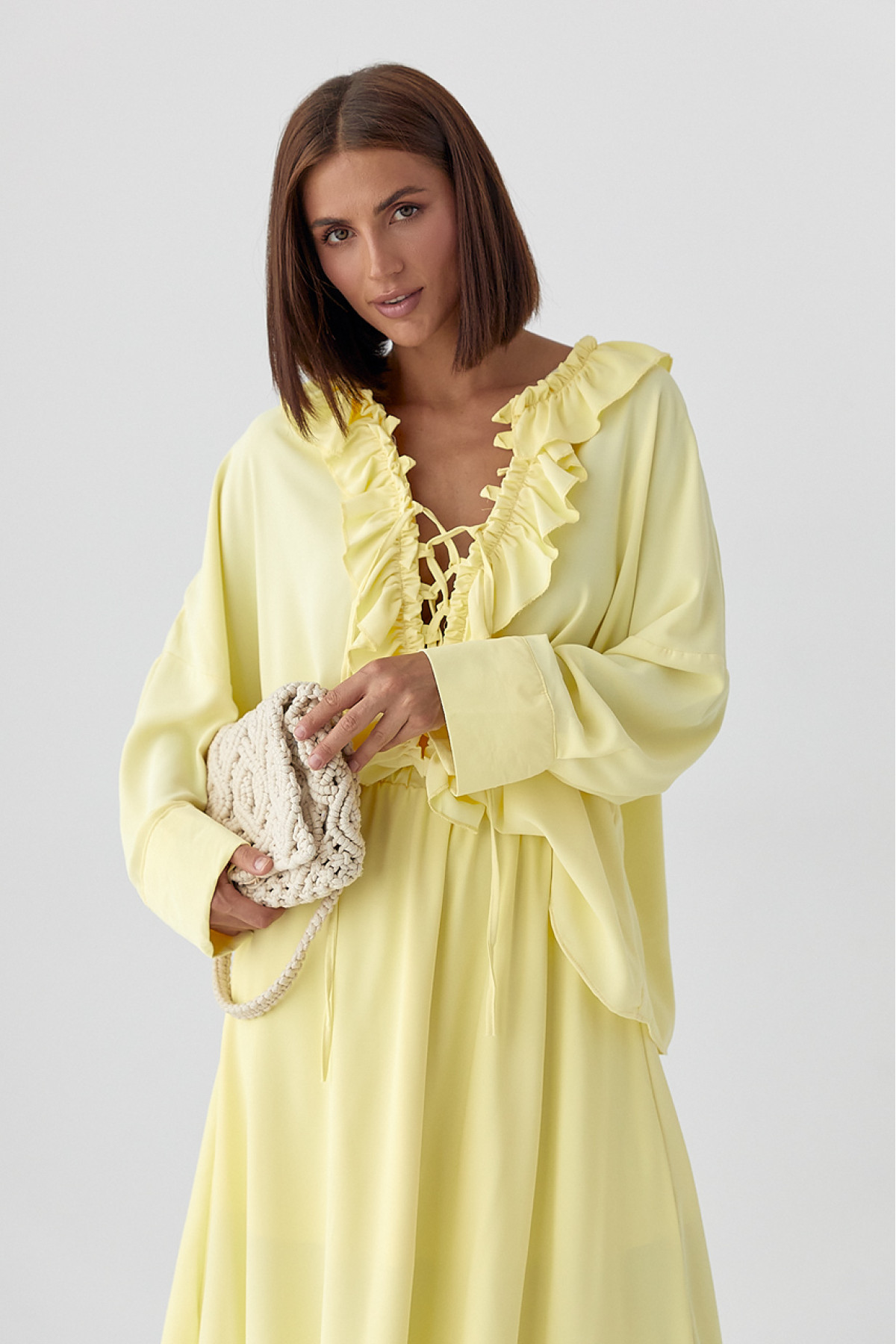 Костюм з рюшами зі спідниці та блузи  лимонний колір